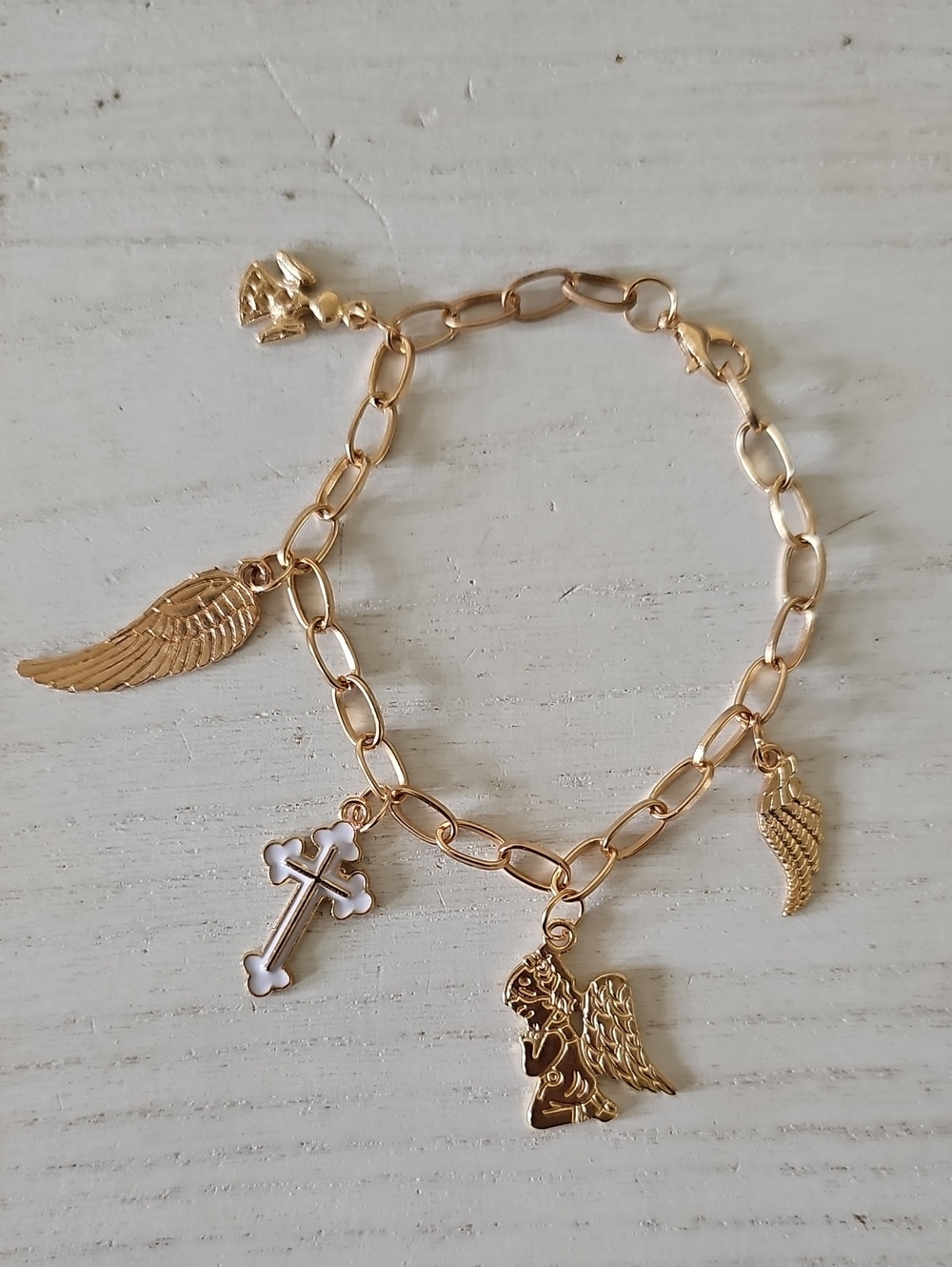 Gold Tone Angel Wing Charm Bracelet with Cross and Cherub